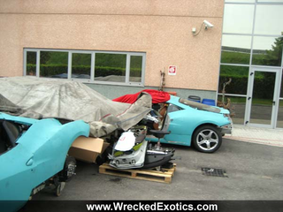 Illustration for article titled Wrecked Ferrari 458 Italias Hide Shame Under Tarps